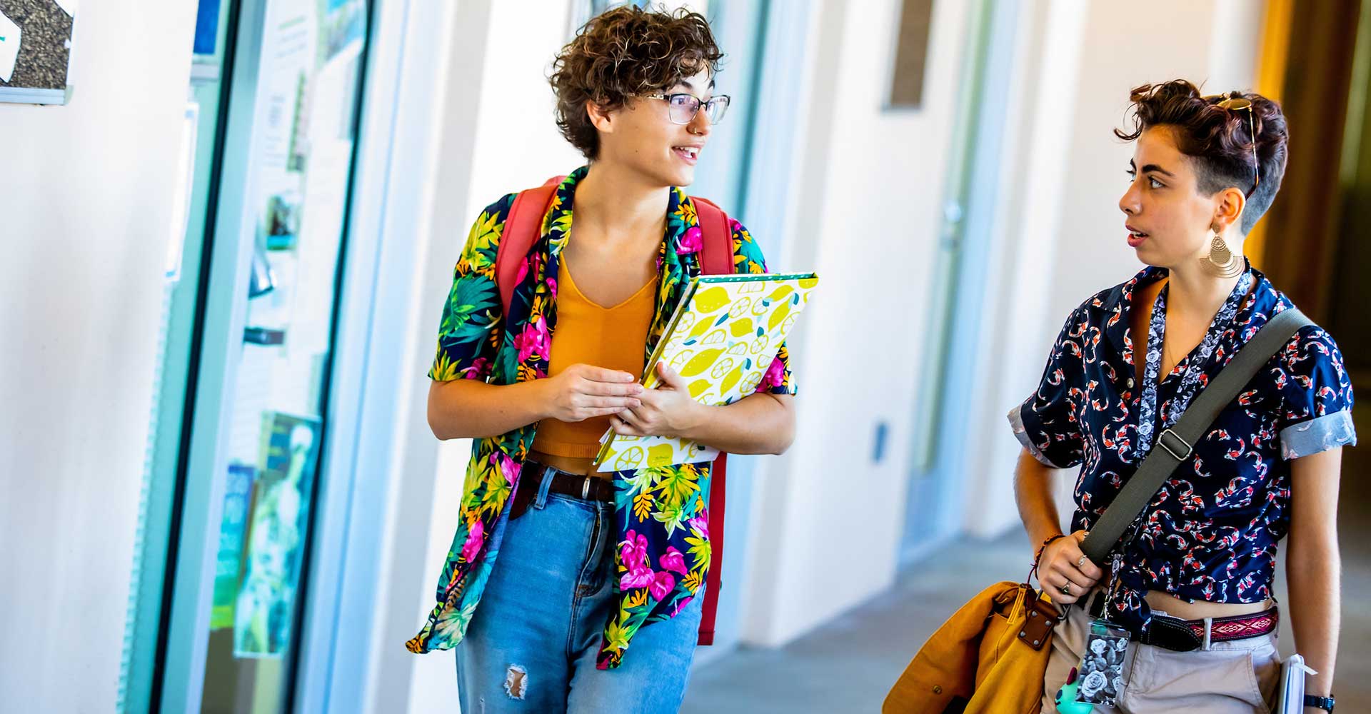 students walking in hallway on campus